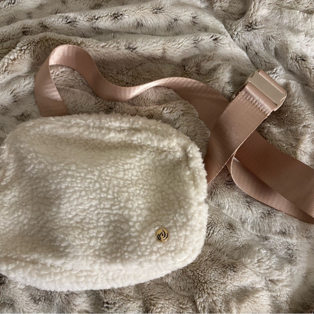 Plush White Sherpa Cross Body Bag w Adjustable Satin Strap & Utility Buckle.